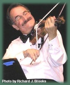 Image of Paul Anastasio playing fiddle.